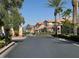 Gated entrance to the community with landscaping at 1024 Eaglewood Dr, Las Vegas, NV 89144