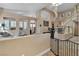 Spacious living room with high ceilings, a staircase, and a neutral color palette at 2213 Fawn Ridge St, Las Vegas, NV 89134