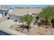 Single-story house with a two-car garage and desert landscaping at 2888 Cattail Cove St, Laughlin, NV 89029