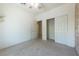 Well-lit bedroom featuring ceiling fan and built-in shelving at 2888 Cattail Cove St, Laughlin, NV 89029