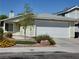 Charming single-story home with a well-maintained lawn and attached garage at 7008 Copperleaf Dr, Las Vegas, NV 89128