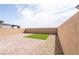 Artificial turf backyard with patio and sitting area at 9662 Dalton Lake St, Las Vegas, NV 89178