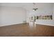 Spacious living room with wood-look tile at 9028 Firebird Dr, Las Vegas, NV 89134