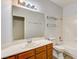 Simple bathroom with wood vanity and shower/tub combo at 8752 Reef Island Ct, Las Vegas, NV 89147