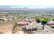 Aerial view showing a house nestled in a quiet cul-de-sac with mountain views at 2428 Hydrus Ave, Henderson, NV 89044