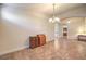 Dining area with wooden table and chairs, adjacent to kitchen at 159 Birch Ridge Ave, Las Vegas, NV 89183