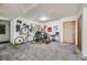 Basement room with bikes, workout equipment, and a desk at 745 N Royal Crest Cir # 115, Las Vegas, NV 89169