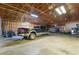 Spacious garage with high ceilings, ample space for vehicles and storage at 1430 Red Rock Dr, Pahrump, NV 89048