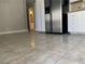 View of dining area and kitchen with tile floor at 3614 Calmosa St, Las Vegas, NV 89103