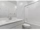 Clean bathroom with a shower-tub combo and a white single sink vanity at 7013 Fossil Rim St # 0, North Las Vegas, NV 89084