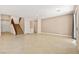 Large living room with stairs, tile floors, and an open feel at 6741 Kyle Stewart Ct, North Las Vegas, NV 89086