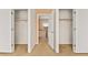 Hallway with two closets and loft access at 6741 Kyle Stewart Ct, North Las Vegas, NV 89086