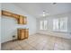 Kitchen with oak cabinets, granite countertops, and tiled floor at 902 Noche De Paz Ave, Henderson, NV 89015