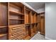 Walk-in closet with custom built-ins and organizers at 200 Villa Borghese St, Las Vegas, NV 89138