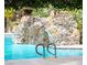 Community pool with waterfall feature at 2200 S Fort Apache Rd # 2023, Las Vegas, NV 89117