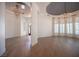 Bright living room with hardwood floors, bay windows, and plantation shutters at 8130 Cassian Ct, Las Vegas, NV 89129