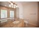 Bathroom with granite countertop, large mirror and bathtub at 8130 Cassian Ct, Las Vegas, NV 89129