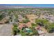 Luxury estate home with pool and mountain views, aerial view at 8130 Cassian Ct, Las Vegas, NV 89129