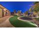 Expansive backyard with trampoline, artificial turf and pool at 2780 El Camino Rd, Las Vegas, NV 89146