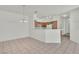 Dining room with kitchen and chandelier at 107 Topsail Dr, Boulder City, NV 89005