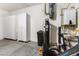 Garage with storage cabinets, water softener, and water heater at 8375 Hunter Brook St, Las Vegas, NV 89139