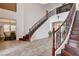 Impressive entryway featuring a curved staircase and wood flooring at 4129 Fabulous Finches Ave, North Las Vegas, NV 89084