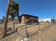 Two-story building with a fenced yard and exterior staircase at 536 North Cir, Las Vegas, NV 89119