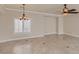 Dining room with tile flooring and chandelier at 1115 Aldenwood Ave, Las Vegas, NV 89123