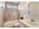 Clean bathroom with tile shower/tub combo and modern vanity at 10315 Premia Pl, Las Vegas, NV 89135