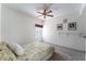 Bedroom with ceiling fan and window coverings at 10710 Destination Ln # 201, Las Vegas, NV 89144