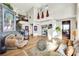 Bright living room with hardwood floors, high ceilings, and a staircase at 127 Birch Ridge Ave, Las Vegas, NV 89183