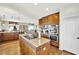 Kitchen features island, stainless steel appliances, and hardwood floors at 127 Birch Ridge Ave, Las Vegas, NV 89183