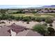 Aerial view of the house and surrounding golf course community at 1214 Country Club Dr, Laughlin, NV 89029