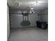 Attached garage with automatic door opener and epoxy floor at 2179 Tiger Willow Dr, Henderson, NV 89012