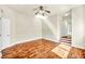 Bright bedroom with hardwood floors and ceiling fan at 9208 November Breeze St, Las Vegas, NV 89123