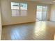 Bright living room with tile floors and sliding glass doors at 744 Monroe Hill Pl, Henderson, NV 89011