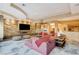 Elegant living room featuring a modern fireplace and built-in media wall at 60 Innisbrook Ave, Las Vegas, NV 89113