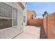 Small, private patio area with brick wall at 4805 Principle Ct, North Las Vegas, NV 89031