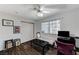 Bright bedroom with dark wood floors and ceiling fan at 2851 S Valley View Blvd # 1120, Las Vegas, NV 89102