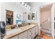 Bathroom features double vanity, granite countertop, and a walk-in shower at 2087 Angel Falls Dr, Henderson, NV 89074