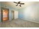 Spacious bedroom with carpet, ceiling fan and double door closet at 3550 Bay Sands Dr # 2079, Laughlin, NV 89029