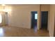 Living area with tile floors and access to other rooms and exterior at 3423 Chedworth Rd, North Las Vegas, NV 89031