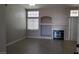 Bright living room featuring a fireplace and tile flooring at 3717 Iverson Ln, North Las Vegas, NV 89032