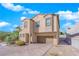 Two-story house with attached garage and landscaped front yard at 6898 Coral Cloud Ct, Las Vegas, NV 89142