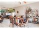 Dining area with dark wood table and six chairs, near kitchen at 1417 Red Sunset Ave, Henderson, NV 89074