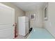 Laundry room with a refrigerator and workspace at 7045 Eldora Ave, Las Vegas, NV 89117