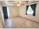 Spacious bedroom with tiled floors and window at 534 Krysta Ln, Pahrump, NV 89060