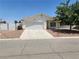 Single-story house with a two-car garage at 534 Krysta Ln, Pahrump, NV 89060