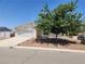 Single-story house with a mature tree in front at 534 Krysta Ln, Pahrump, NV 89060