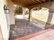 Covered patio with brick pavers and access to the backyard at 289 Helmsdale Dr, Henderson, NV 89014